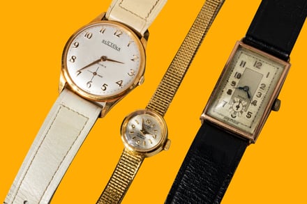 three watches, gold background hero